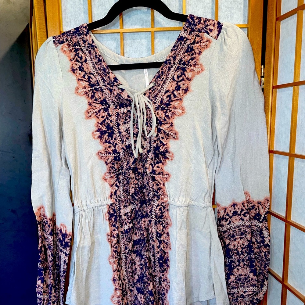 Renaissance-style lace-up neckline, long-sleeved blouse